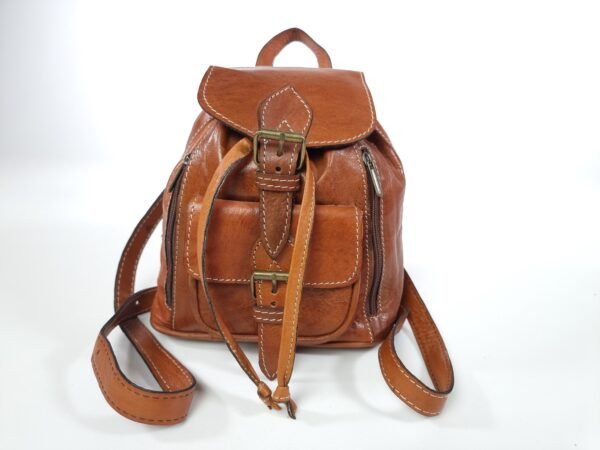 a brown leather backpack