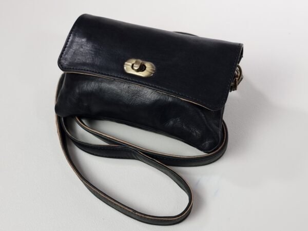 A black crossbody handbag