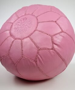 a pink Moroccan leather pouf
