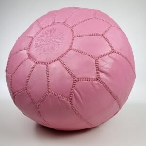 a pink Moroccan leather pouf